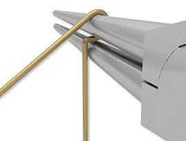 Wire being bent with round-nose pliers.